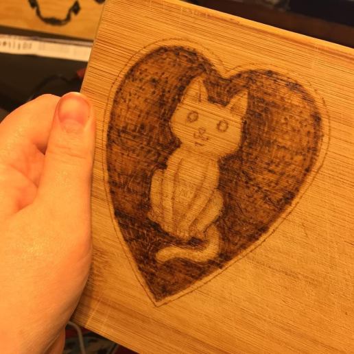 My first attempt at pyrography (on an old cutting board)